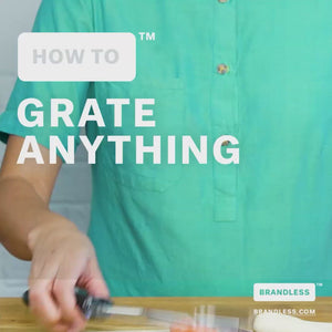 Video, captions: How to Grate Anything.  More than cheese. Fresh garlic: Faster than a knife. Woman then moves to shaving a chunk of chocolate onto a desert with whipped topping, Yum! Next is a lime for the perfect citrus zest. Vegetables to give salads a nutritious boost. Ginger for a bit for sautes and sauces. So Easy! Brandless.
