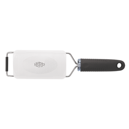 Cheese grater shown with it's white plastic clip-on blade guard which makes storage in drawers easy and safe for both your fingers and keeping the blades sharp.