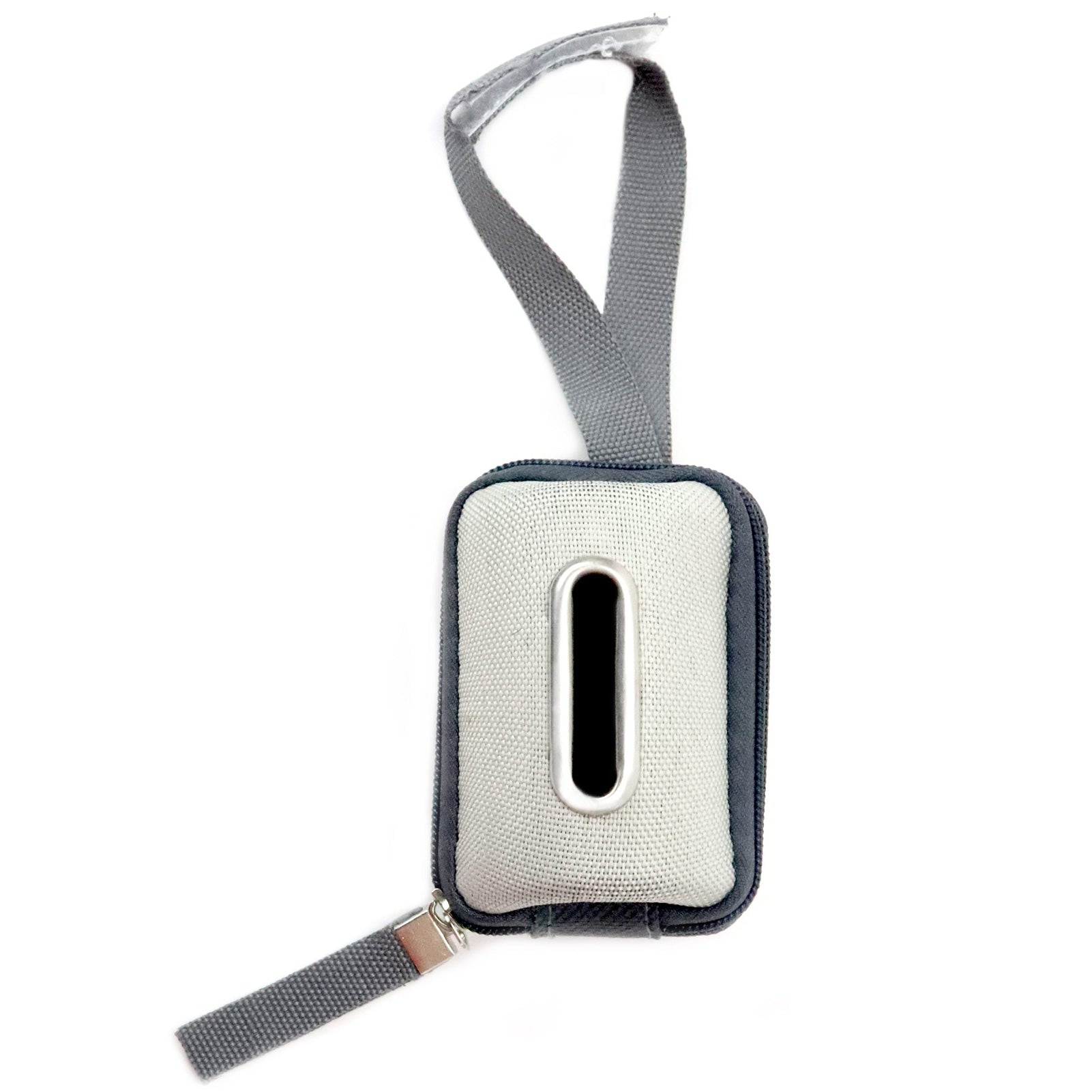 Top view, waste bag dispenser, empty, showing metal-rimmed dispensing slot.